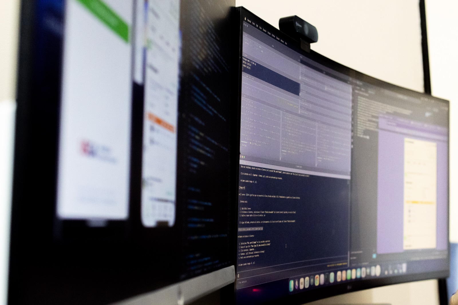 Developer workstations running code at Dallio's studio in Ensenada, Baja California